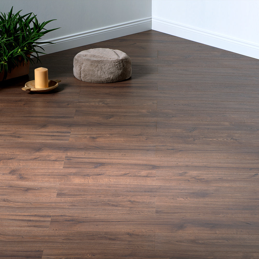 Close-up of rich brown waterproof laminate flooring, Parkay Endurance 14 collection in Dakota Brown