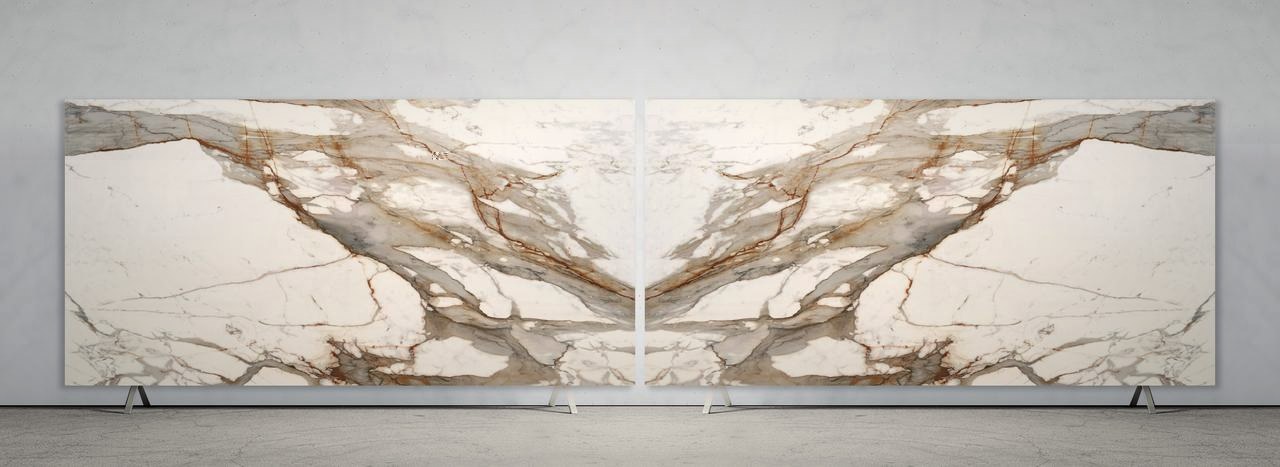 Bookmatched large-format porcelain slabs with dramatic marble-look veining, displayed in a Tampa showroom
